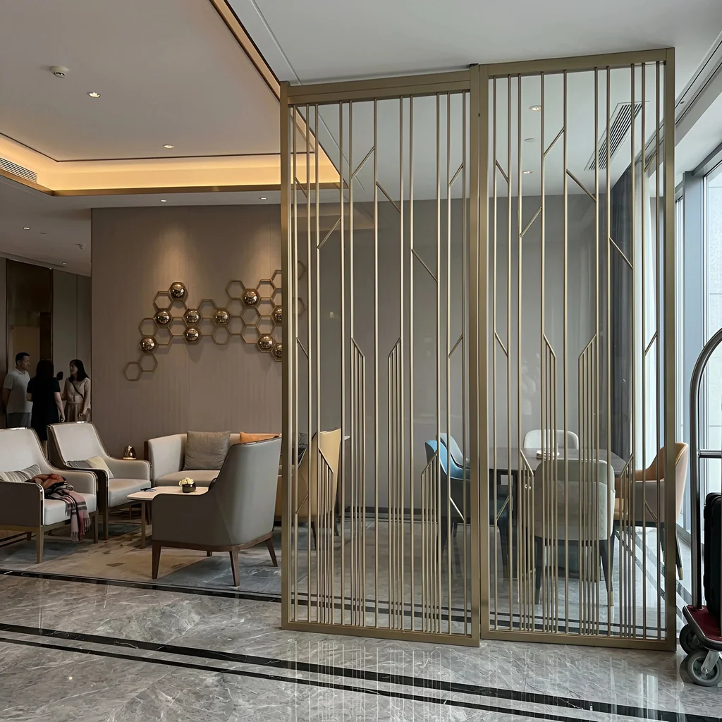 Champagne gold linear grid screen zoning a hotel lobby — visualization